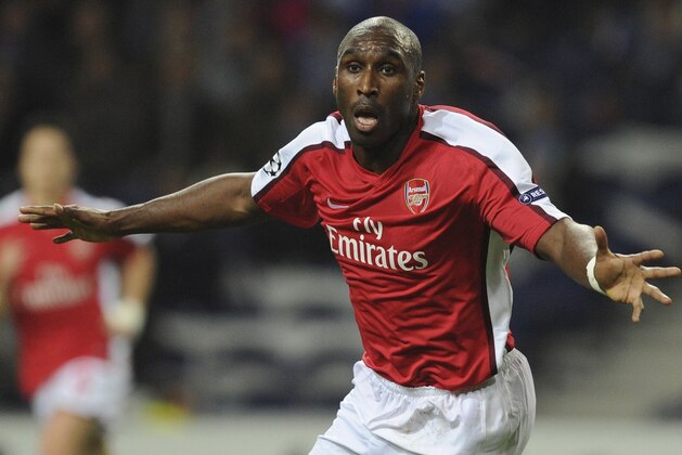 FILE - This is a Wednesday, Feb. 17, 2010 file photo of Arsenal's Sol Campbell  as he celebrates after scoring against FC Porto in a Champions League round of 16 first leg soccer match at Porto's Dragon Stadium in Porto, Portugal. Campbell announced his retirement from soccer Wednesday May 2, 2012.  (AP Photo/Paulo Duarte, File)