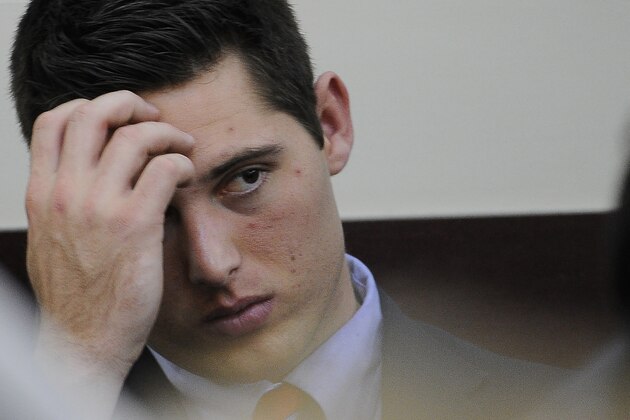 Brandon Vandenburg looks at the jury as Judge Wilkins reads the charges during his trial on Tuesday, Jan. 27, 2015, in Nashville, Tenn. The jury deliberated for three hours before announcing that Vandenburg and Cory Batey were guilty of aggravated rape and aggravated sexual battery. (AP Photo/The Tennessean, John Partipilo, Pool)