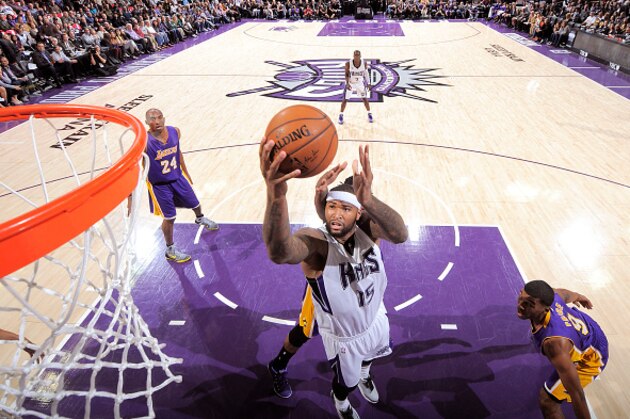 SACRAMENTO, CA - DECEMBER 21: DeMarcus Cousins #15 of the Sacramento Kings shoots a layup against the Los Angeles Lakers on December 21, 2014 at Sleep Train Arena in Sacramento, California. NOTE TO USER: User expressly acknowledges and agrees that, by downloading and or using this photograph, User is consenting to the terms and conditions of the Getty Images Agreement. Mandatory Copyright Notice: Copyright 2014 NBAE (Photo by Rocky Widner/NBAE via Getty Images)