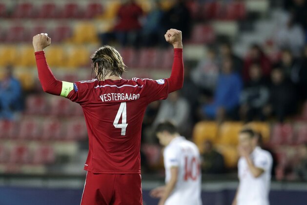 Denmark’s Jannik Vestergaard celebrates victory after the Euro U21 soccer championship group A match between Denmark and Serbia, at the Letna stadium in Prague, Czech Republic, Tuesday, June 23, 2015. (AP Photo/Petr David Josek)