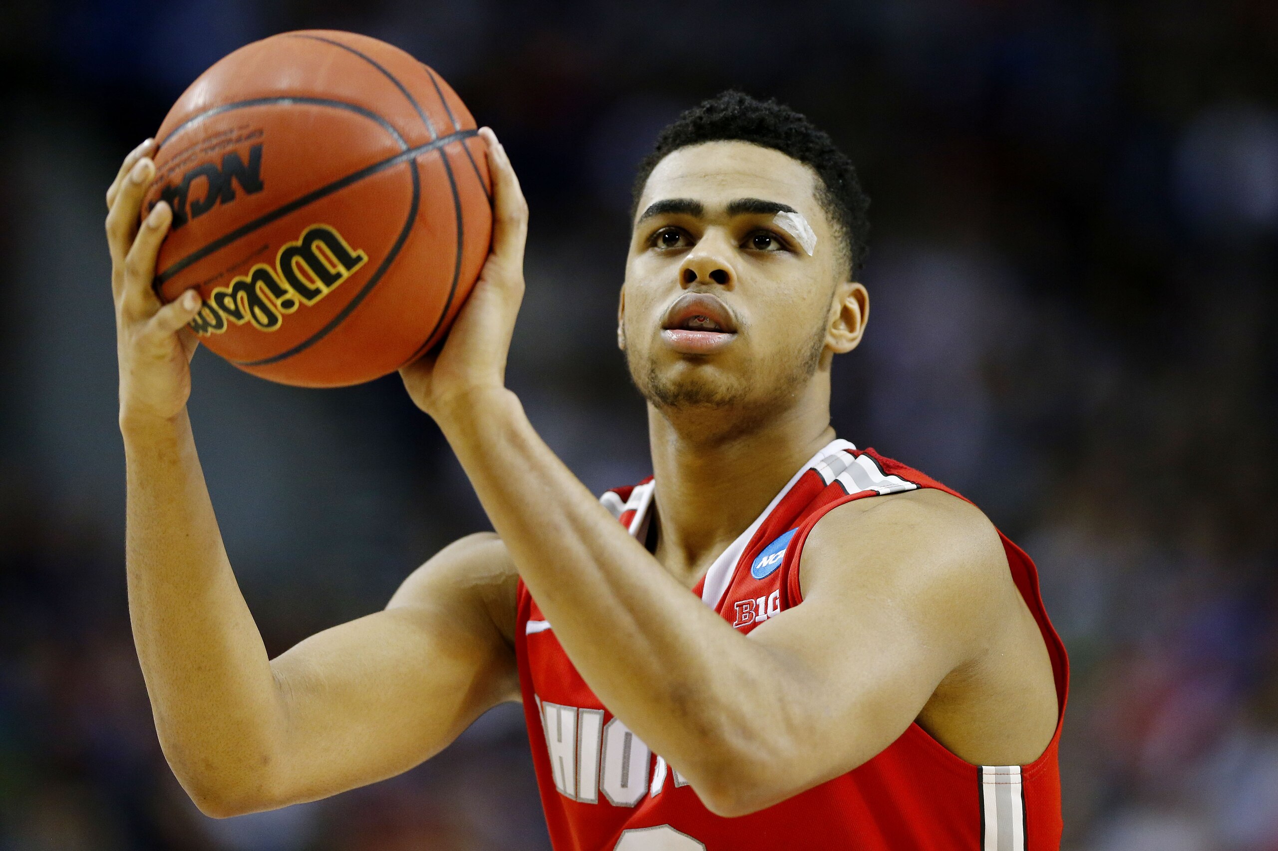 PORTLAND, OR - MARCH 21:  D'Angelo Russell #0 of the Ohio State Buckeyes takes a free htrow in the second half against the Arizona Wildcats during the third round of the 2015 NCAA Men's Basketball Tournament at Moda Center on March 21, 2015 in Portland, Oregon.  (Photo by Jonathan Ferrey/Getty Images)