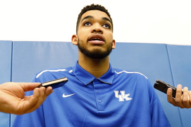 Kentucky NCAA college basketball player Karl-Anthony Towns speaks to reporters after announcing his intent to place his name in the NBA draft during a news conference at the Joe Craft Center, Thursday, April 9, 2015, in Lexington, Ky. (AP Photo/James Crisp)