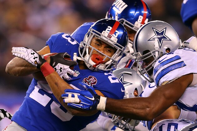 EAST RUTHERFORD, NJ - NOVEMBER 23:  Rashad Jennings #23 of the New York Giants carries the ball against the Dallas Cowboys at MetLife Stadium on November 23, 2014 in East Rutherford, New Jersey.  (Photo by Elsa/Getty Images)