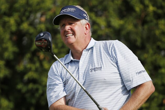 Colin Montgomerie, of Scotland, watches his drive from the 17th tee during the final round of the Senior Players Championship golf tournament in Belmont, Mass., Sunday, June 14, 2015. Montgomerie checked out OK after heading to the hospital with chest pains before playing on Sunday. (AP Photo/Michael Dwyer)