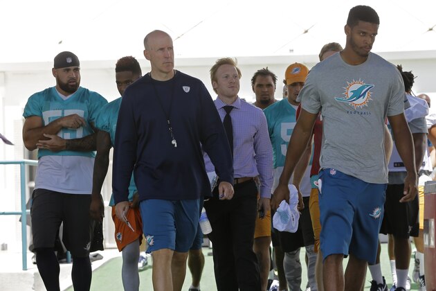 Miami Dolphins head coach Joe Philbin and players head for lunch before NFL football minicamp,   Wednesday, June 17, 2015, in Davie, Fla. (AP Photo/Alan Diaz)