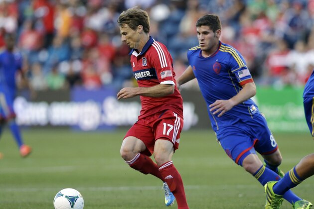 Chicago Fire midfielder Chris Rolfe (17) controls the ball against Colorado Rapids midfielder Dillon Powers (8) during the first half of an MLS soccer match in Bridgeview, Ill., Wednesday, June 19, 2013. The Fire won 2-1. (AP Photo/Nam Y. Huh)