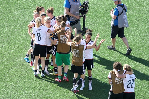 OTTAWA, ON - JUNE 20: Celia Sasic #13 of Germany celebrates the win against Sweden with her teammates during the FIFA Women's World Cup Canada 2015 round of 16 match between Germany and Sweden at Lansdowne Stadium on June 20, 2015 in Ottawa, Canada.  (Photo by Jana Chytilova/Getty Images)