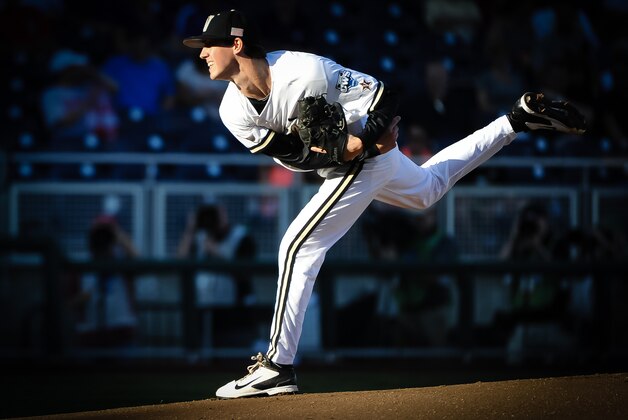 Jun 19, 2015; Omaha, NE, USA; Vanderbilt Commodores pitcher Walker Buehler (13) pitches against the TCU Horned Frogs in the first inning in the 2015 College World Series at TD Ameritrade Park. Mandatory Credit: Steven Branscombe-USA TODAY Sports