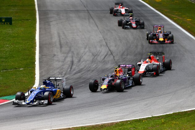 SPIELBERG, AUSTRIA - JUNE 21:  Daniil Kvyat of Russia and Infiniti Red Bull Racing drives with a damaged front wing during the Formula One Grand Prix of Austria at Red Bull Ring on June 21, 2015 in Spielberg, Austria.  (Photo by Dan Istitene/Getty Images)