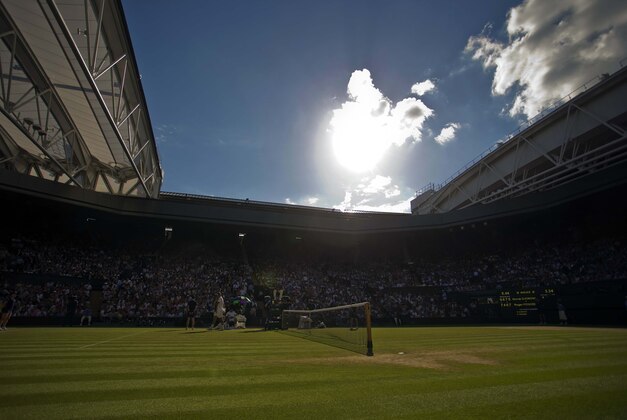 Jul 6, 2014; London, United Kingdom; General view of Centre Court during the match between  Roger Federer (SUI) and Novak Djokovic (SRB) on day 13 of the 2014 Wimbledon Championships at the All England Lawn and Tennis Club. Mandatory Credit: Susan Mullane-USA TODAY Sports