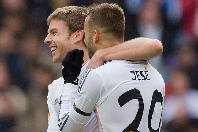 MADRID, SPAIN - FEBRUARY 22: Asier Illarramendi (L) of Real Madrid CF celebrates scoring their opening goal with teammate Jese Rodriguez (R) during the La Liga match between Real Madrid CF and Elche CF at Estadio Santiago Bernabeu on February 22, 2014 in Madrid, Spain.  (Photo by Gonzalo Arroyo Moreno/Getty Images)