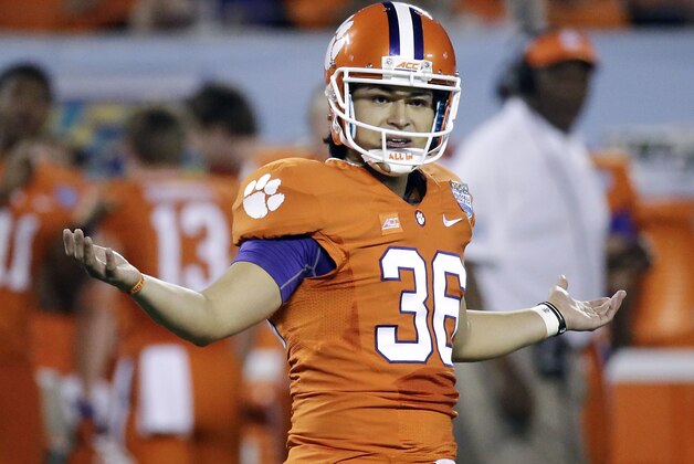 Clemson place kicker Ammon Lakip (36) gestures to the Oklahoma side of the field after kicking a field goal during the first half of the Russell Athletic Bowl NCAA college football game in Orlando, Fla., Monday, Dec. 29, 2014. (AP Photo/John Raoux)