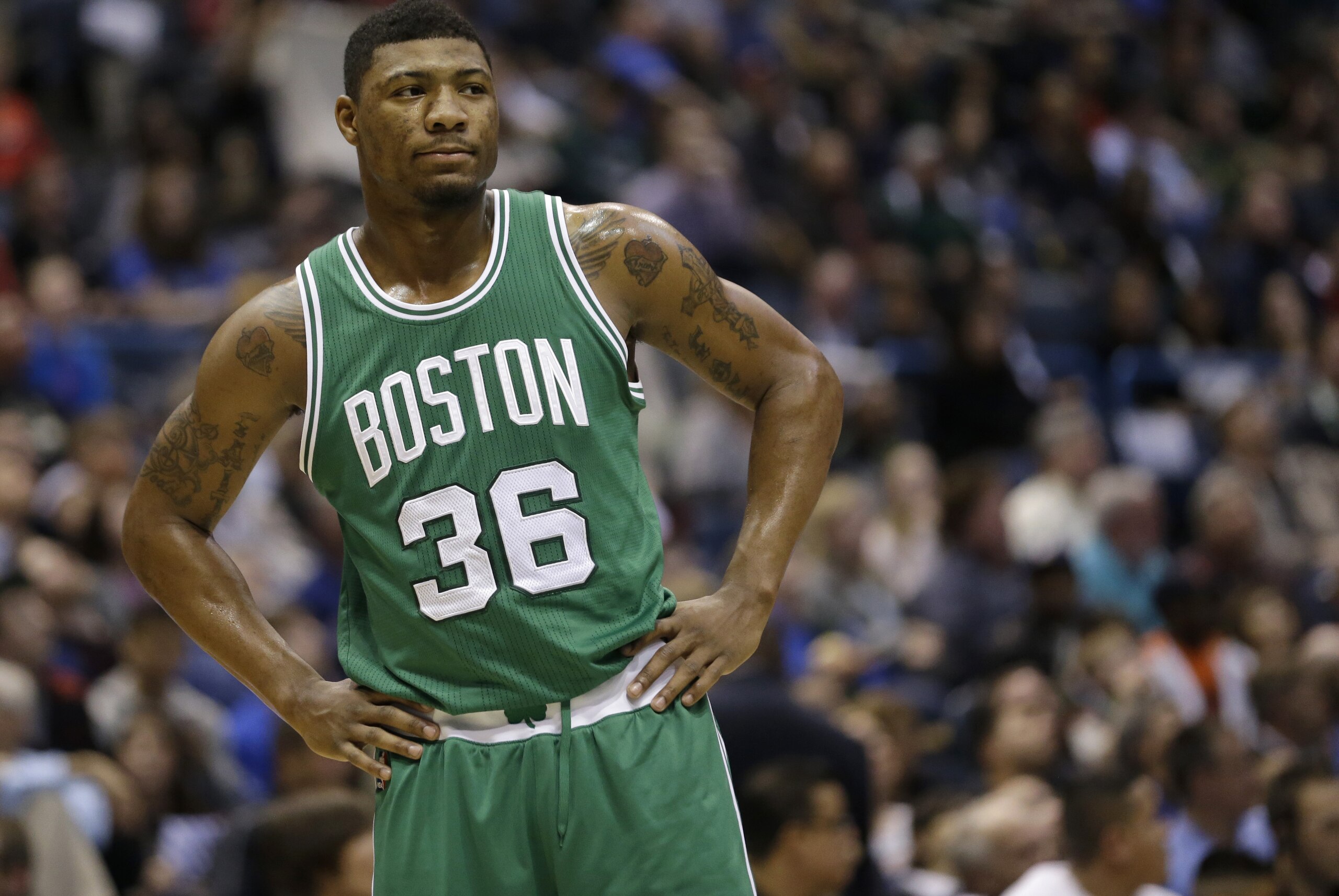 Boston Celtics' Marcus Smart looks away during an NBA basketball game against the Milwaukee Bucks Wednesday, April 15, 2015, in Milwaukee. (AP Photo/Aaron Gash)