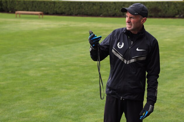 BEAVERTON, OR - APRIL 13: Coach Alberto Salazar of the Nike Oregon Project times athletes as they train on the grass at the Nike campus on April 13, 2013 in Beaverton, Oregon. (Photo by Doug Pensinger/Getty Images) BEAVERTON, OR - APRIL 13: Coach Alberto Salazar of the Nike Oregon Project times athletes as they train on the grass at the Nike campus on April 13, 2013 in Beaverton, Oregon. (Photo by Doug Pensinger/Getty Images)
