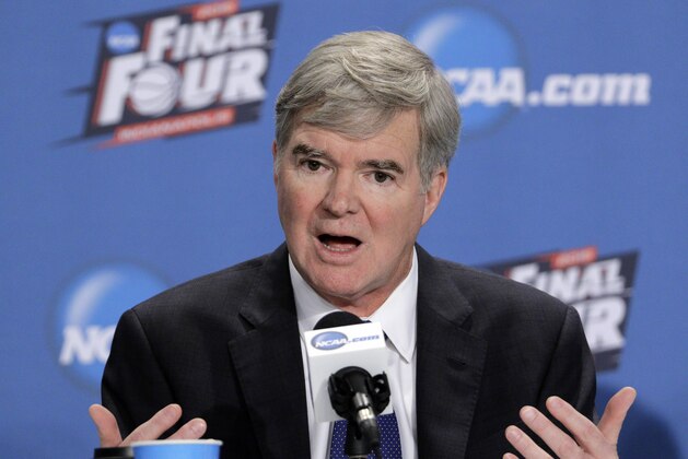 NCAA President Mark Emmert answers questions during a news conference at the Men's Final Four college basketball tournament Thursday, April 2, 2015, in Indianapolis. (AP Photo/David J. Phillip)