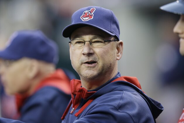 Cleveland Indians manager Terry Francona is seen in the dugout during the first inning of a baseball game against the Detroit Tigers in Detroit, Friday, Sept. 12, 2014. (AP Photo/Carlos Osorio)