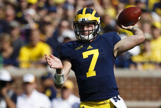 Sep 27, 2014; Ann Arbor, MI, USA; Michigan Wolverines quarterback Shane Morris (7) passes the ball in the first half against the Minnesota Golden Gophers at Michigan Stadium. Mandatory Credit: Rick Osentoski-USA TODAY Sports