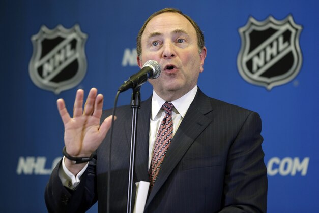 NHL hockey commissioner Gary Bettman speaks to the media, Monday, Dec. 8, 2014, after attending an NHL owners meeting in Boca Raton, Fla. (AP Photo/Wilfredo Lee)