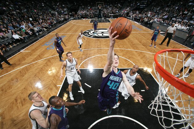 NEW YORK, NY - MARCH 4:  Cody Zeller #40 of the Charlotte Hornets goes to the basket against the Brooklyn Nets on March 4, 2015 at the Barclays Center in the Brooklyn borough of New York City. NOTE TO USER: User expressly acknowledges and agrees that, by downloading and or using this Photograph, user is consenting to the terms and conditions of the Getty Images License Agreement. Mandatory Copyright Notice: Copyright 2015 NBAE (Photo by Nathaniel S. Butler/NBAE via Getty Images)