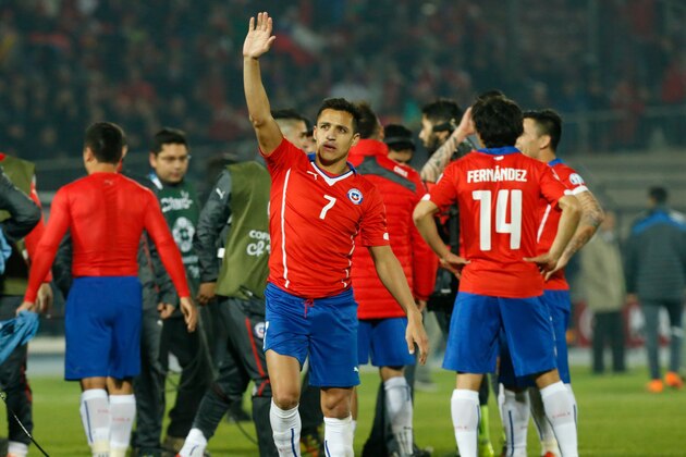 Chile's Alexis Sanchez celebrates at the end of the match against Uruguay during a Copa America quarterfinal soccer match at the National Stadium in Santiago, Chile, Wednesday June 24, 2015. (AP Photo/Luis Hidalgo)