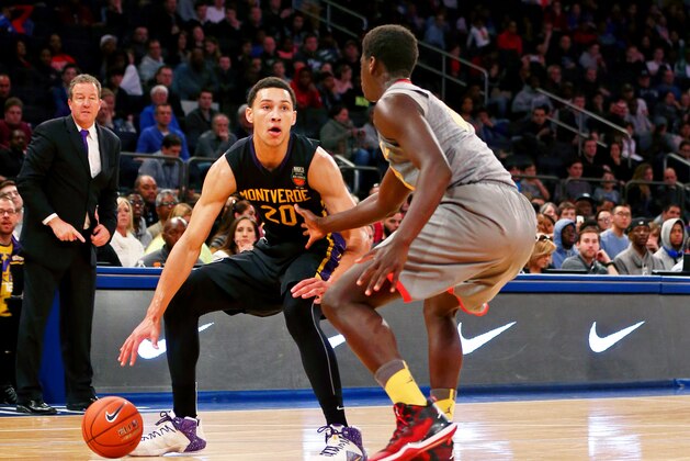 Apr 4, 2015; New York, NY, USA; Oak Hill Academy forward Khadim Sy (31) defends as Montverde Academy  guard/forward Ben Simmons (20)  plays the ball during the second half during the Dick's Sporting Goods High School Nationals boys final game at at Madison Square Garden. Montverde defeated Oak Hill 70-61 to win the national championship. Mandatory Credit: Andy Marlin-USA TODAY Sports