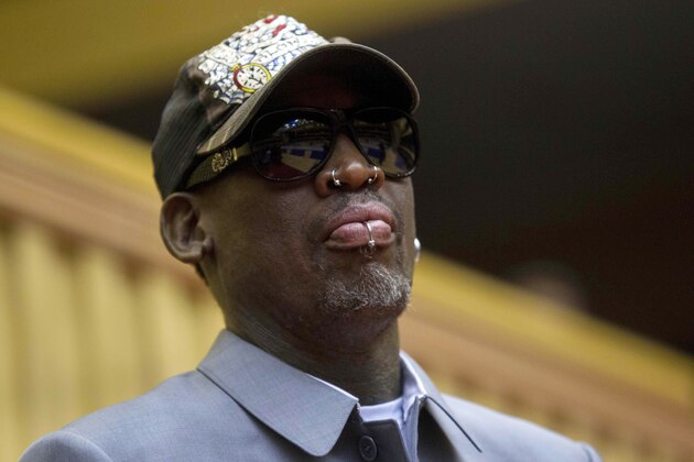 FILE - In this Jan. 8, 2014, file photo, former NBA basketball player Dennis Rodman looks out at the court at the end of an exhibition basketball game with U.S. and North Korean players at an indoor stadium in Pyongyang, North Korea. Rodman checked into an alcohol-rehabilitation center to reevaluate his life, not give up drinking. He spent three weeks in a New Jersey-based facility when he returned from his latest trip to North Korea.(AP Photo/Kim Kwang Hyon, File)
