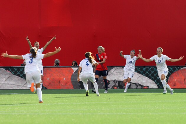 OTTAWA, ON - JUNE 22: Lucy Bronze #12 of England celebrates her goal with teammates against Norway during the FIFA Women's World Cup Canada 2015 round of 16 match between Norway and England at Lansdowne Stadium on June 22, 2015 in Ottawa, Canada.  (Photo by Francois Laplante/FreestylePhoto/Getty Images)