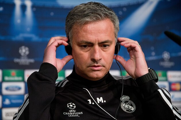 MADRID, SPAIN - APRIL 02:  Head coach Jose Mourinho buts his headphones in order to listen to questions from the media during a press conference ahead of the UEFA Champions League Quarterfinal match between Real Madrid and Galatasaray AS at Santiago Bernabeu Stadium on April 2, 2013 in Madrid, Spain.  (Photo by Gonzalo Arroyo Moreno/Getty Images)