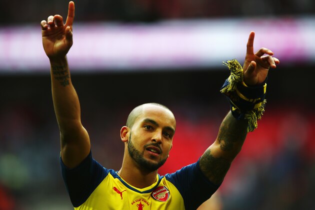 LONDON, ENGLAND - MAY 30:  Theo Walcott of Arsenal celebrates victory after the FA Cup Final between Aston Villa and Arsenal at Wembley Stadium on May 30, 2015 in London, England. Arsenal beat Aston Villa 4-0.  (Photo by Clive Rose/Getty Images)
