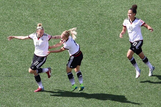 OTTAWA, ON - JUNE 20: Anja Mittag #11 of Germany celebrates her first goal of the game with team mates Leonie Maier #4 and Celia Sasic #13 in the first half during the FIFA Women's World Cup Canada 2015 round of 16 match between Germany and Sweden at Lansdowne Stadium on June 20, 2015 in Ottawa, Canada.  (Photo by Jana Chytilova/Getty Images)