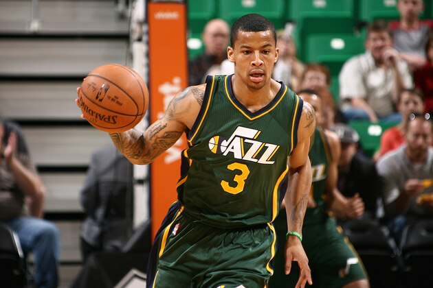 SALT LAKE CITY, UT - MARCH 25:  Trey Burke #3 of the Utah Jazz dribbles against the Portland Trail Blazers on March 25, 2015 at EnergySolutions Arena in Salt Lake City, Utah. NOTE TO USER: User expressly acknowledges and agrees that, by downloading and or using this photograph, User is consenting to the terms and conditions of the Getty Images License Agreement.  Mandatory Copyright Notice:  Copyright 2015 NBAE (Photo by Melissa Majchrzak/NBAE via Getty Images)