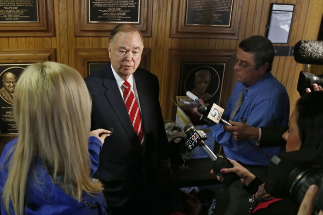 University of Oklahoma President David Boren talks with the media before the start of a Board of Regents meeting in Oklahoma City, Tuesday, March 10, 2015. Two students have been expelled from the University following an incident in which members of a fraternity were caught on video chanting a racial slur. (AP Photo/Sue Ogrocki)