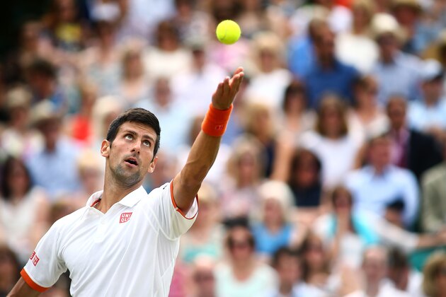 STOKE POGES, ENGLAND - JUNE 25:  Novak Djokovic of Serbia serves during his match against Richard Gasquet of France during Day 3 of The Boodles Tennis Event at Stoke Park on June 25, 2015 in Stoke Poges, England.  (Photo by Jordan Mansfield/Getty Images)