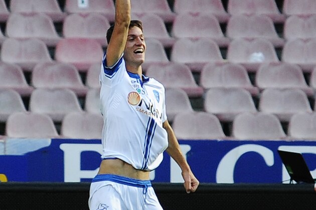 Empoli's Daniele Rugani celebrates after scoring Empoli's second goal during a Serie A soccer match between Napoli and Empoli, at the San Paolo stadium in Naples, Italy, Sunday, Dec. 7, 2014. (AP Photo/Salvatore Laporta)