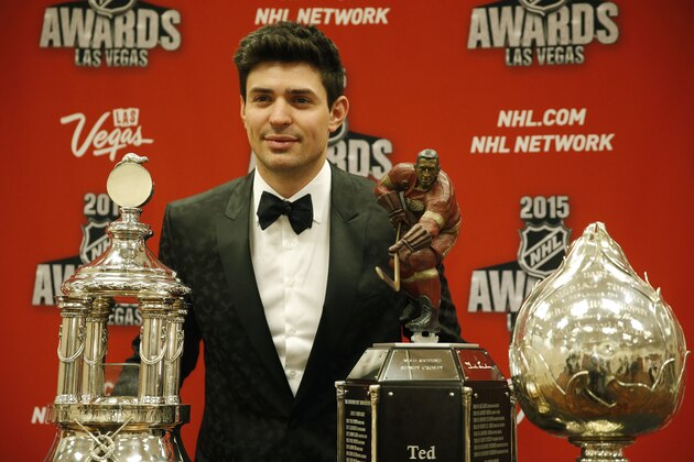 Carey Price of the Montreal Canadiens poses after winning several awards at the NHL Awards show Wednesday, June 24, 2015, in Las Vegas. (AP Photo/John Locher)