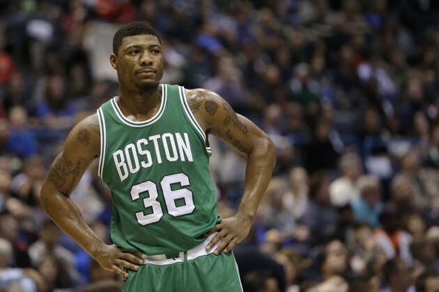 Boston Celtics' Marcus Smart looks away during an NBA basketball game against the Milwaukee Bucks Wednesday, April 15, 2015, in Milwaukee. (AP Photo/Aaron Gash)