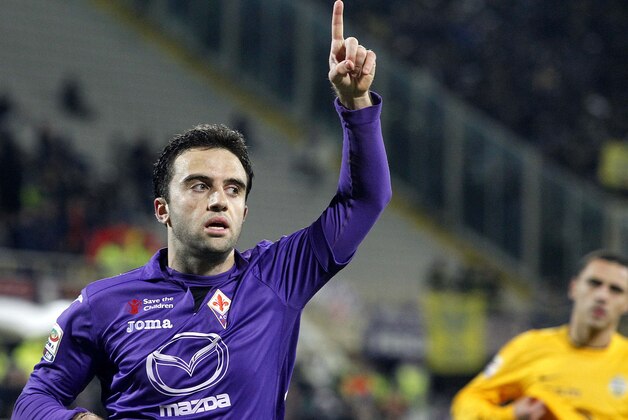 Fiorentina's Giuseppe Rossi celebrates after scoring  during a Serie A soccer match between Fiorentina and Verona at the Artemio Franchi stadium in Florence, Italy, Monday, Dec. 2,  2013. (AP Photo/Fabrizio Giovannozzi)