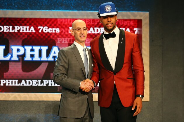 NEW YORK, NY - JUNE 25: Jahlil Okafor poses with Commissioner Adam Silver after being selected third overall by the Philadelphia 76ers in the First Round of the 2015 NBA Draft at the Barclays Center on June 25, 2015 in the Brooklyn borough of  New York City. NOTE TO USER: User expressly acknowledges and agrees that, by downloading and or using this photograph, User is consenting to the terms and conditions of the Getty Images License Agreement.  (Photo by Elsa/Getty Images)