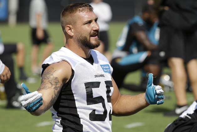 Jacksonville Jaguars Dan Skuta warms up during NFL football organized training activities, Monday, June 8, 2015, in Jacksonville, Fla. (AP Photo/John Raoux)