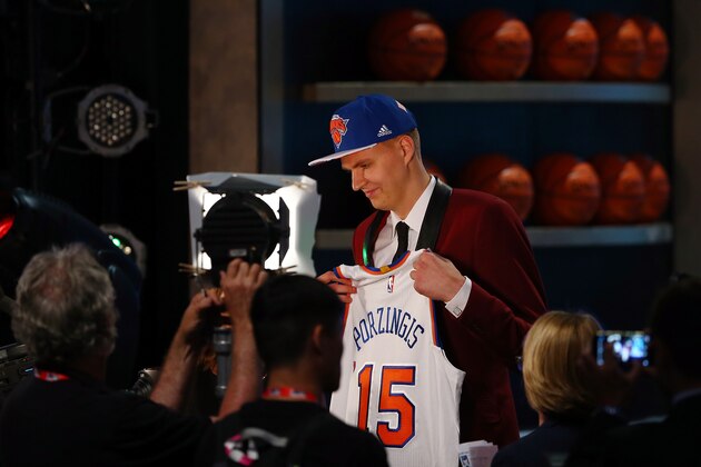 NEW YORK, NY - JUNE 25:  Kristaps Porzingis speaks to the media after being selected fourth overall by the New York Knicks in the First Round of the 2015 NBA Draft at the Barclays Center on June 25, 2015 in the Brooklyn borough of  New York City. NOTE TO USER: User expressly acknowledges and agrees that, by downloading and or using this photograph, User is consenting to the terms and conditions of the Getty Images License Agreement.  (Photo by Elsa/Getty Images)
