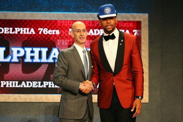 NEW YORK, NY - JUNE 25: Jahlil Okafor poses with Commissioner Adam Silver after being selected third overall by the Philadelphia 76ers in the First Round of the 2015 NBA Draft at the Barclays Center on June 25, 2015 in the Brooklyn borough of  New York City. NOTE TO USER: User expressly acknowledges and agrees that, by downloading and or using this photograph, User is consenting to the terms and conditions of the Getty Images License Agreement.  (Photo by Elsa/Getty Images)
