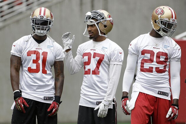 San Francisco 49ers defensive backs L.J. McCray (31), Keith Reaser (27) and Jaquiski Tartt (29) during an NFL football mini-camp in Santa Clara, Calif., Wednesday, June 10, 2015. (AP Photo/Jeff Chiu)