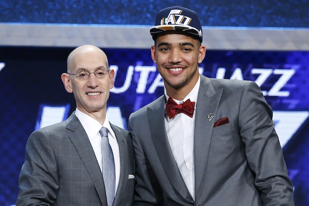 Trey Lyles, right, poses for photos with NBA Commissioner Adam Silver after being selected 12th overall by the Utah Jazz during the NBA basketball draft, Thursday, June 25, 2015, in New York. (AP Photo/Kathy Willens)