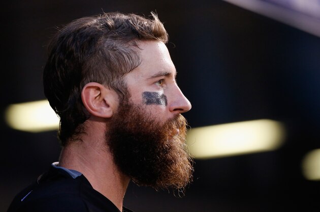 DENVER, CO - JUNE 05:  Charlie Blackmon #19 of the Colorado Rockies looks on from the dugout against the Miami Marlins at Coors Field on June 5, 2015 in Denver, Colorado.  (Photo by Doug Pensinger/Getty Images)
