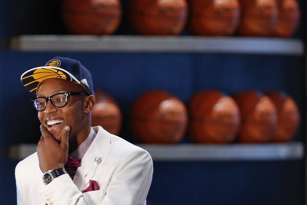 Myles Turner reacts after being selected 10th overall by the Indiana Pacers during the NBA basketball draft, Thursday, June 25, 2015, in New York. (AP Photo/Kathy Willens)