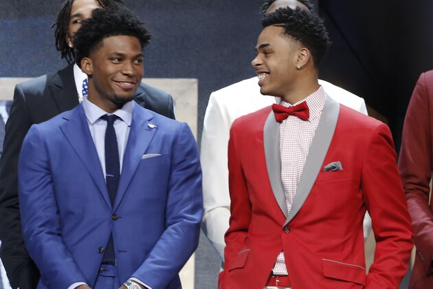 Justise Winslow, left, and D'Angelo Russell talk during photo session before the NBA basketball draft, Thursday, June 25, 2015, in New York. (AP Photo/Kathy Willens)