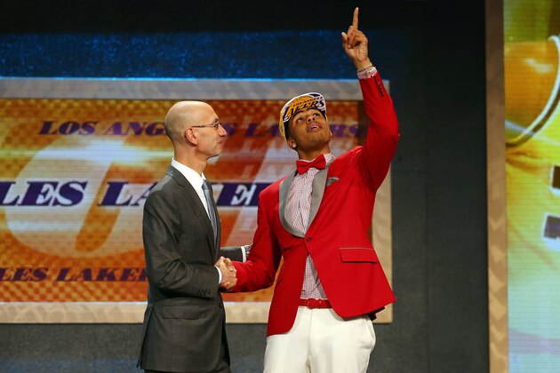 NEW YORK, NY - JUNE 25:  D'Angelo Russell meets with Commissioner Adam Silver after being drafted second overall by the Los Angeles Lakers in the First Round of the 2015 NBA Draft at the Barclays Center on June 25, 2015 in the Brooklyn borough of  New York City. NOTE TO USER: User expressly acknowledges and agrees that, by downloading and or using this photograph, User is consenting to the terms and conditions of the Getty Images License Agreement.  (Photo by Elsa/Getty Images)