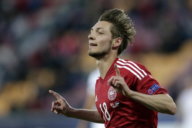 Denmark’s Rasmus Falk celebrates after scoring a goal during the Euro U21 soccer championship group A match between Denmark and Serbia, at the Letna stadium in Prague, Czech Republic, Tuesday, June 23, 2015. (AP Photo/Petr David Josek)