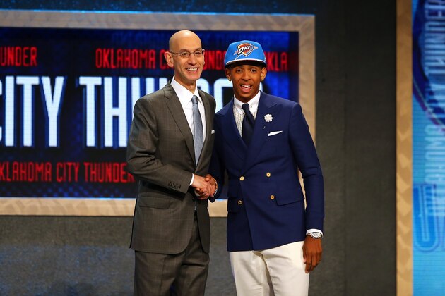 NEW YORK, NY - JUNE 25:  Cameron Payne meets with Commissioner Adam Silver after being selected 14th overall by the Oklahoma City Thunder in the First Round of the 2015 NBA Draft at the Barclays Center on June 25, 2015 in the Brooklyn borough of  New York City. NOTE TO USER: User expressly acknowledges and agrees that, by downloading and or using this photograph, User is consenting to the terms and conditions of the Getty Images License Agreement.  (Photo by Elsa/Getty Images)