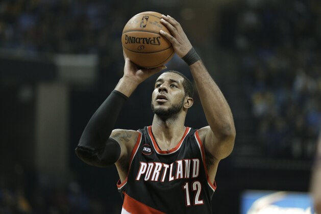 Portland Trail Blazers forward LaMarcus Aldridge shoots a free throw against the Memphis Grizzlies in the first half of Game 2 of an NBA basketball Western Conference playoff series Wednesday, April 22, 2015, in Memphis, Tenn. (AP Photo/Mark Humphrey)